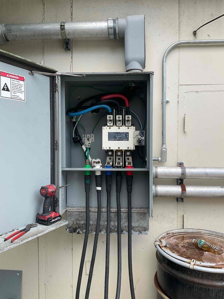 Professionally installed generator docking station with code-compliant electrical connections and conduit